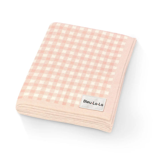 Pink checkered blanket with a 'Bleu La La' label on a white background