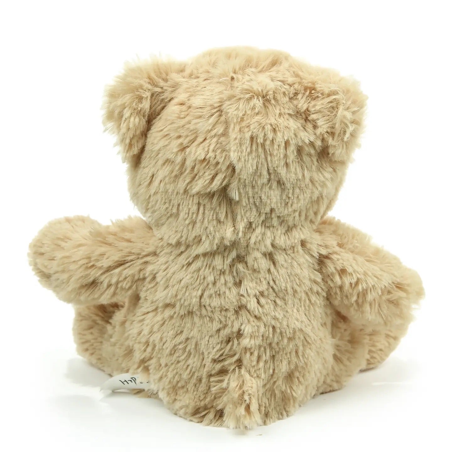 Beige teddy bear plush on a white background, back view
