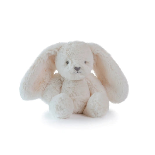 Oatmeal white plush bunny toy on a white background, sitting down
